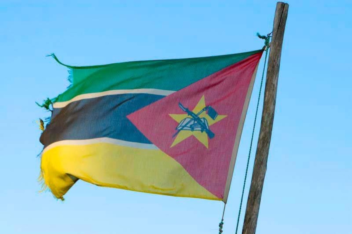Mozambique flag against a blue sky
