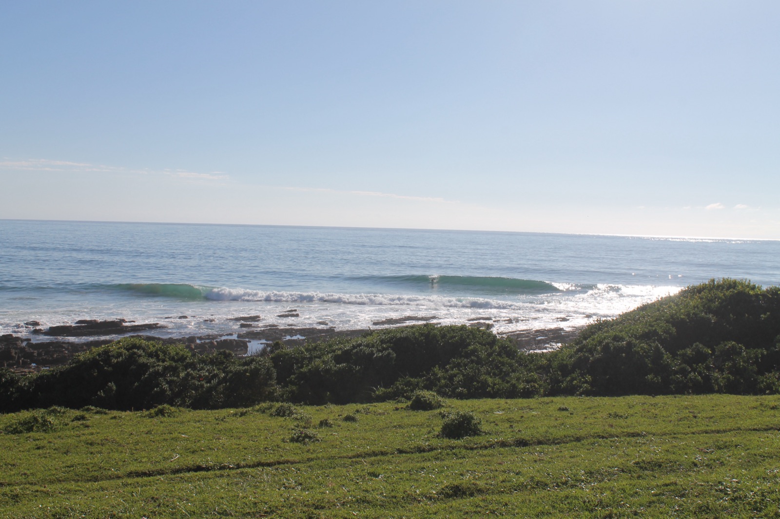 Long pointbreak lines wrapping down the coast
